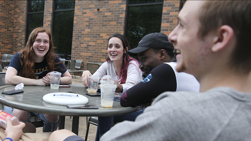 students enjoying a coffee break