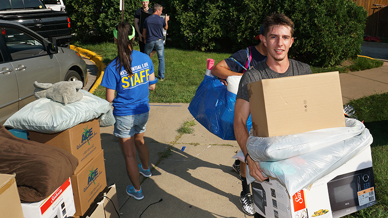 Students moving into the dorm