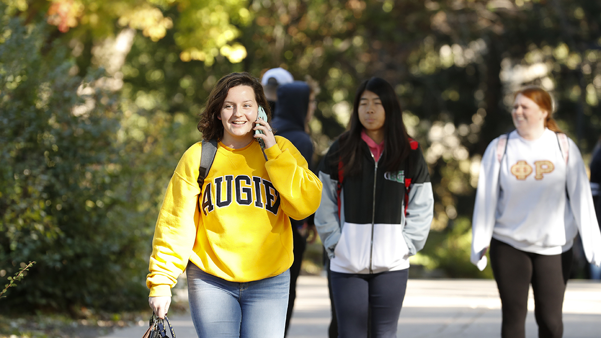 Students walk through the quad between classes