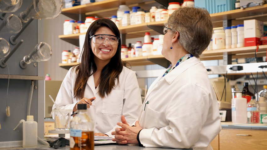 A professor and student working in one of many lab spaces on campus. 