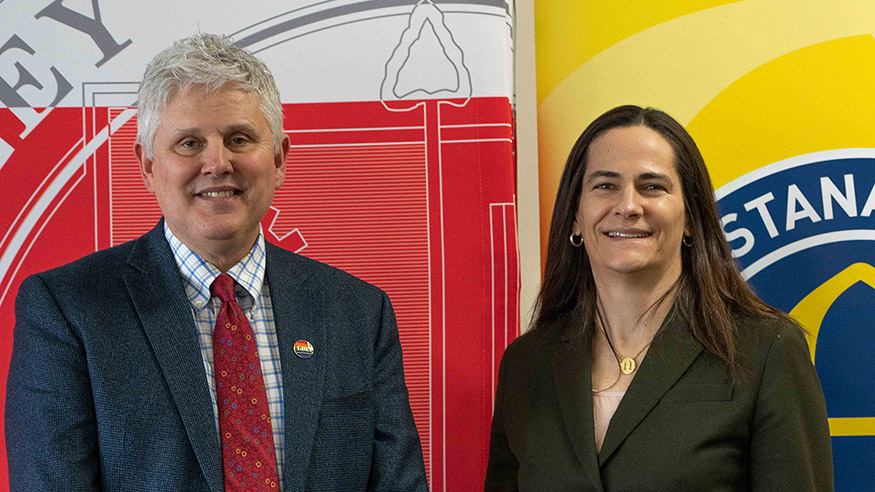 SVCC president Dave Hellmich and Augustana president Andrea Talentino