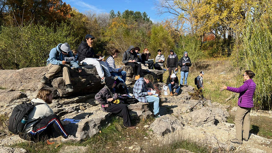 A group of students in an outdoor class