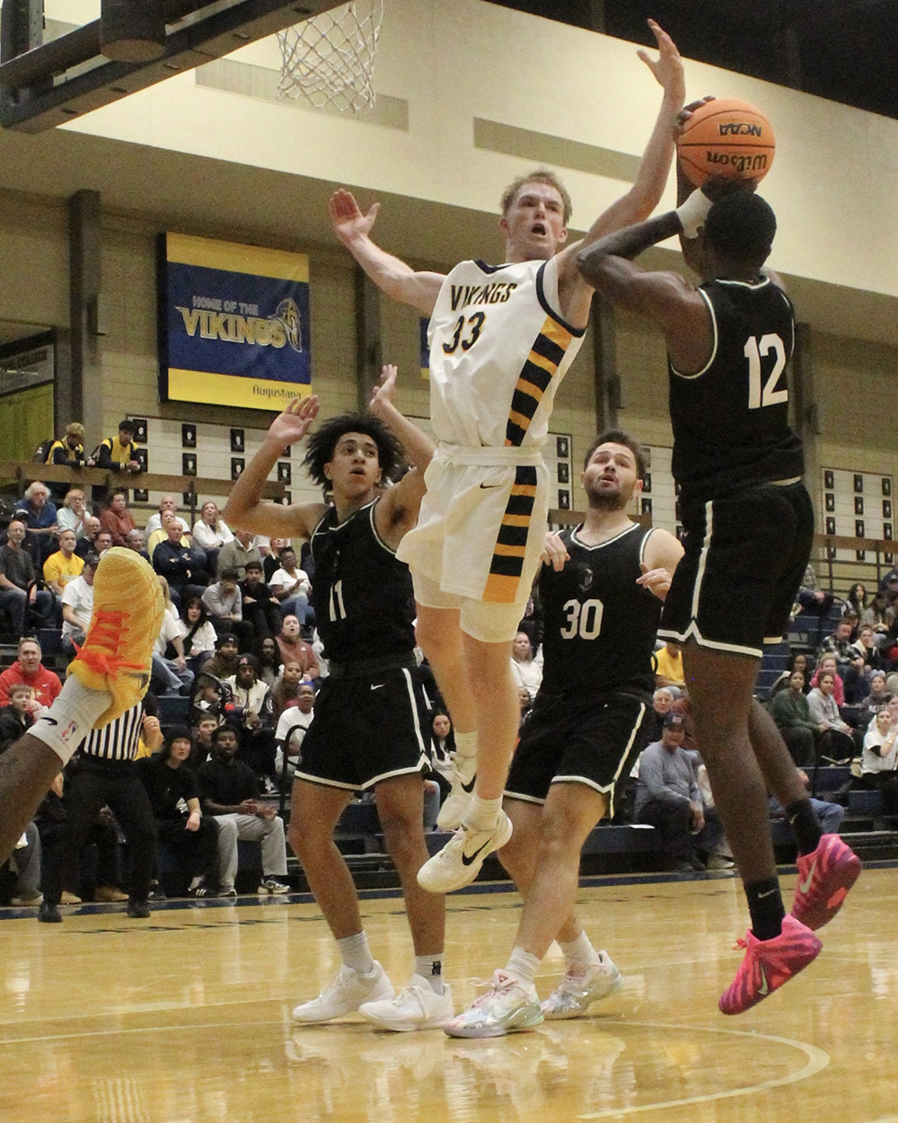 Student-athletes playing basketball
