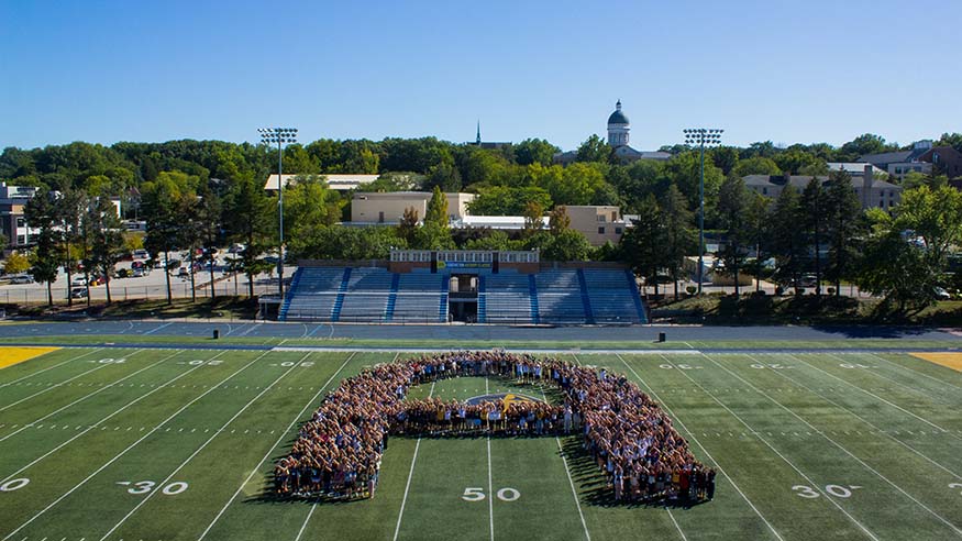 First-year students in the shape of the letter A