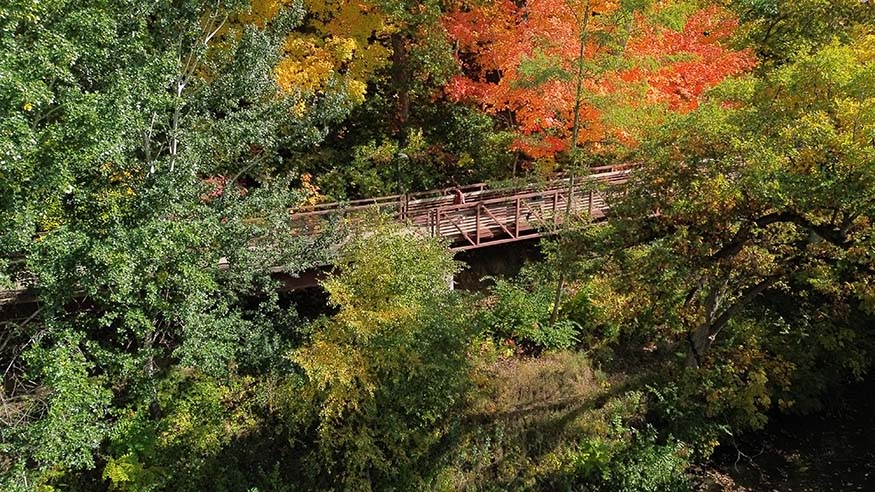 An aerial of the bridge alongside the Slough Path.