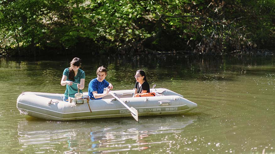 Students conducting research in the Slough.