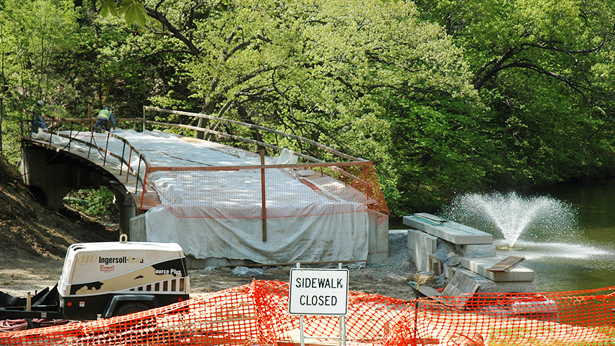 Construction in progress of the bridge alongside the slough. 