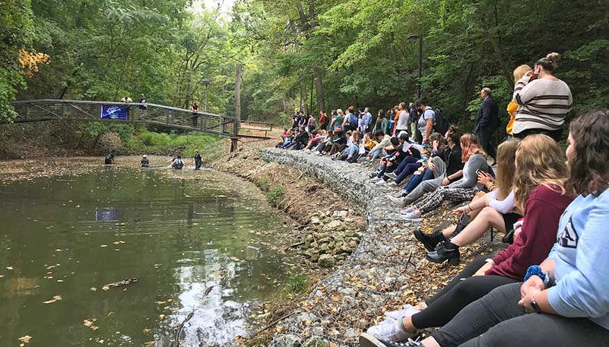 Students watch a demonstration of Augustana's Livingstone Corer.