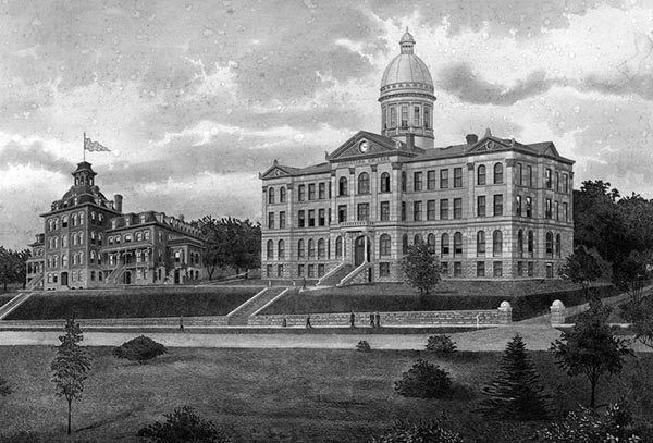 An engraving of Old Main and First Building, 1910