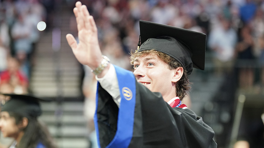 Student waving