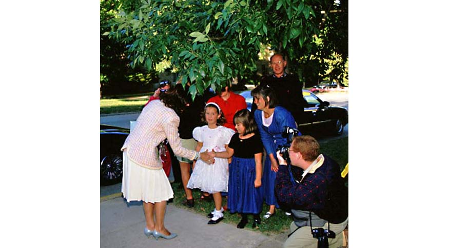 Girls greet Queen Silvia