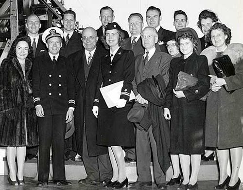June 1945: Augustana alumni at the launching ceremony, including Victory Pearson (center), and William Freistat (back row left).