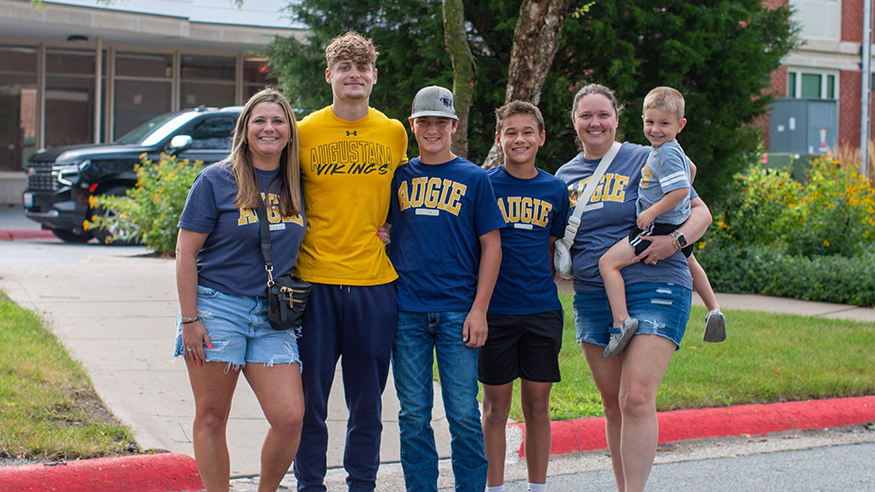 A student and family moving in