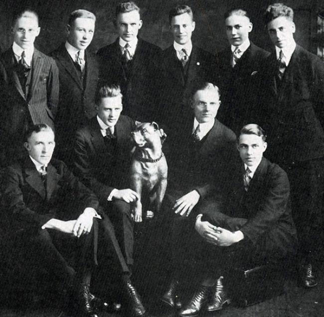 PUGS pose with a dog, from the 1918 Rockety-I (yearbook).