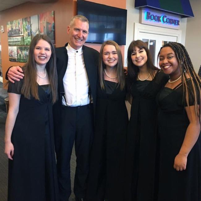 Stephie Benito '20, second from right, with Dr. Jon Hurty and choir friends
