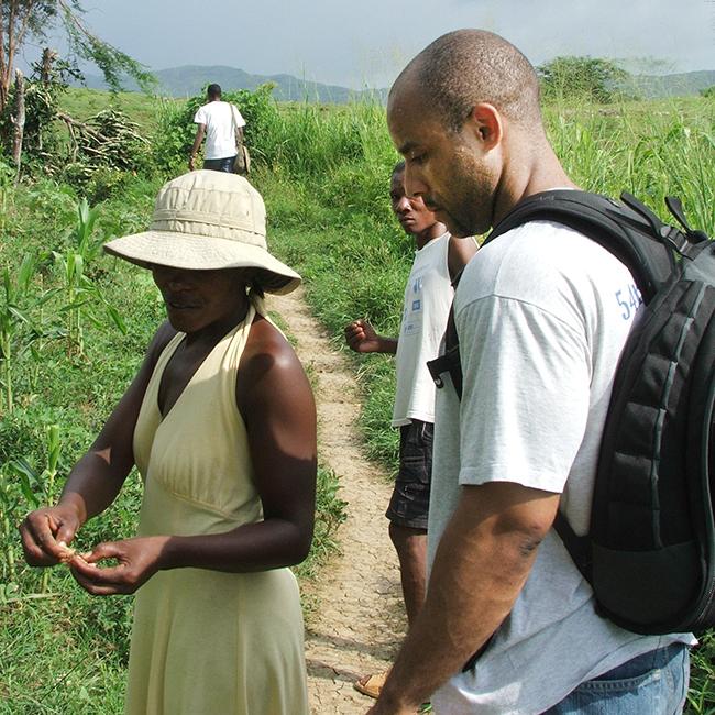 David Walton in field in Haiti (2007 photo)