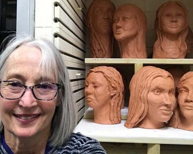 Megan Quinn fired clay heads for her sculpture students