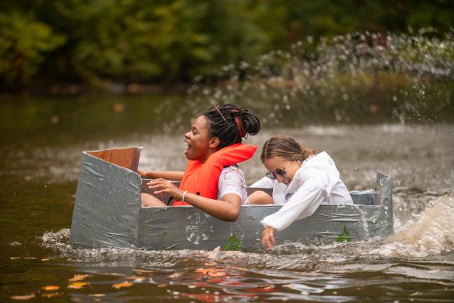 Students in the 2022 Homecoming boat regatta