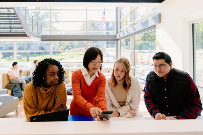 Professor talking with students